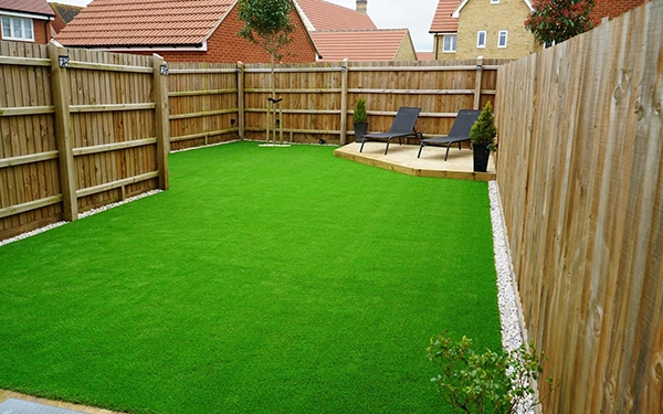 How do I prepare my yard for artificial turf?