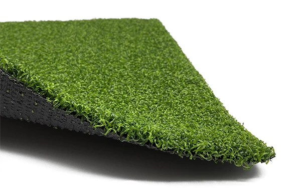 What kind of artificial grass is used in cricket pitches?