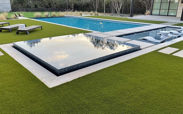 Why Install Artificial Turf Next to Your Pool?