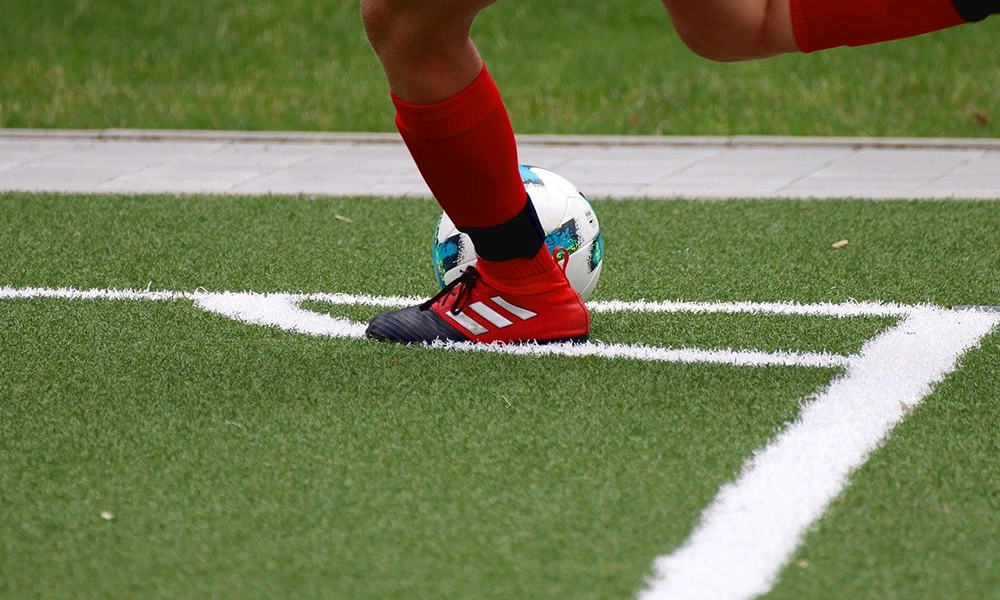 Is it easy to damage artificial grass when playing football?