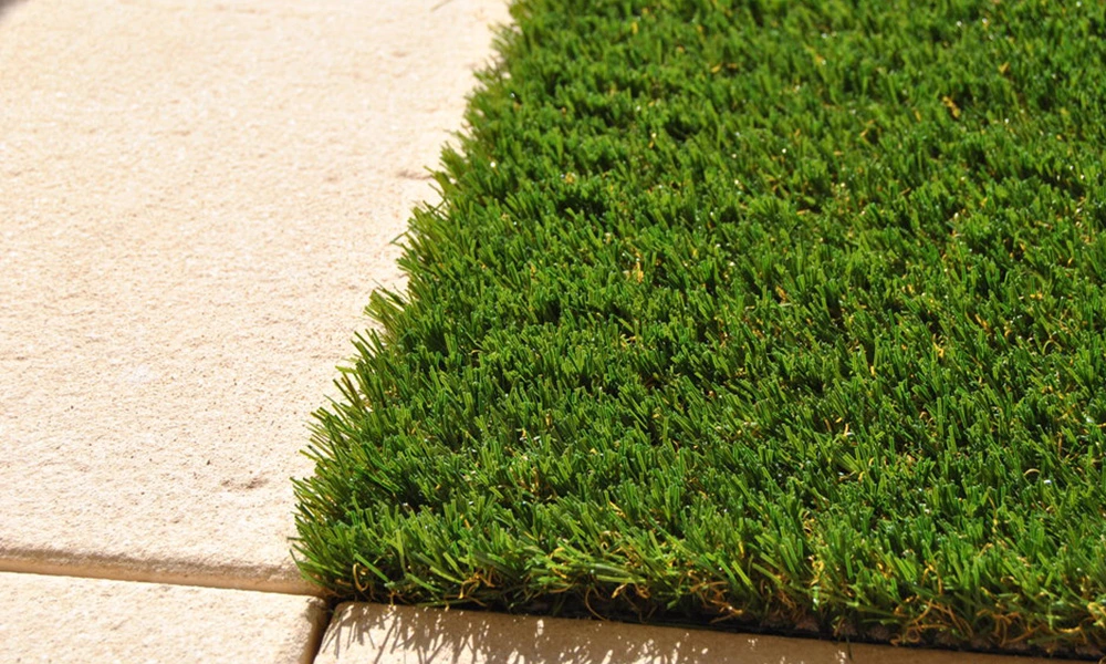 Will artificial grass smell after it rains?