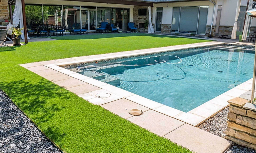 Why Install Artificial Turf Next to Your Pool?