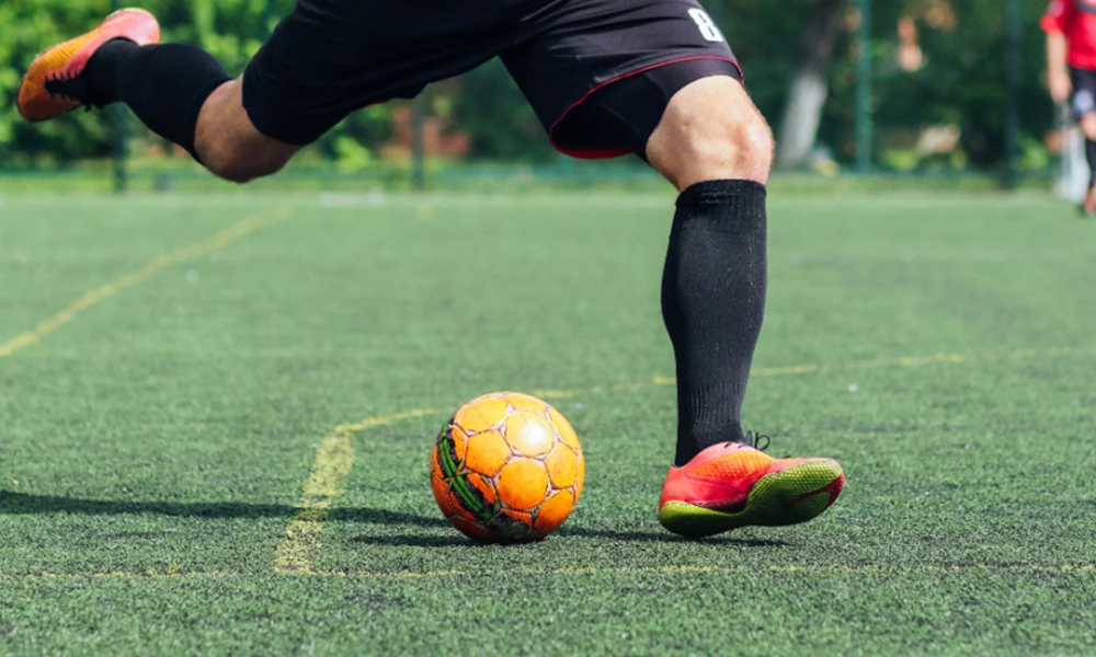 Is it easy to damage artificial grass when playing football?