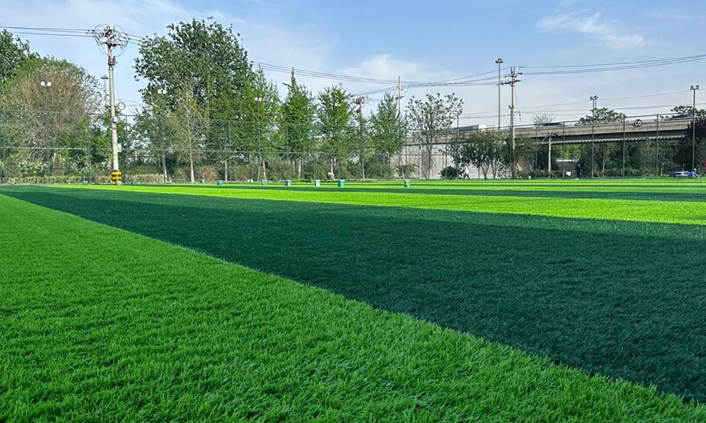 Why is artificial turf the first choice for professional football fields?