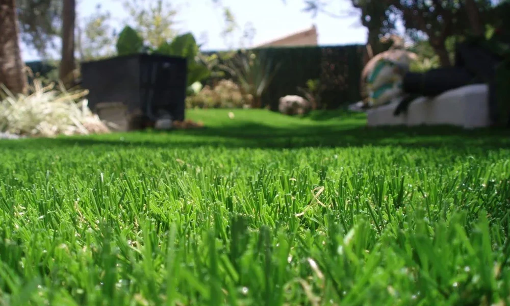 How much sharp sand per m2 artificial grass?