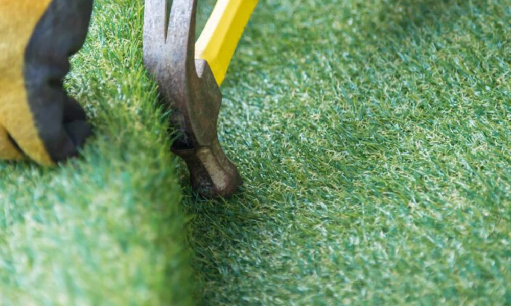 How do you lay artificial grass on a budget?