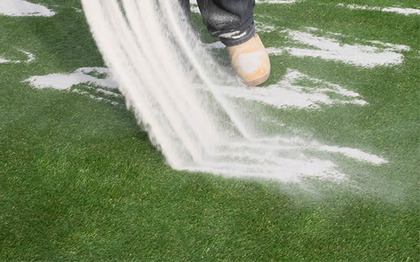 How much sand do you need for artificial grass?