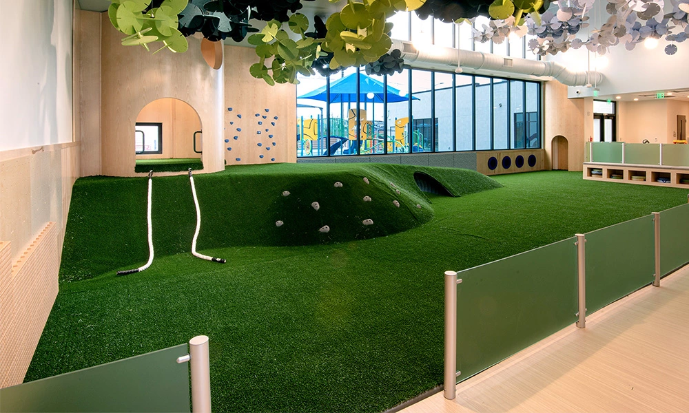 What scenarios can indoor artificial grass be used for?