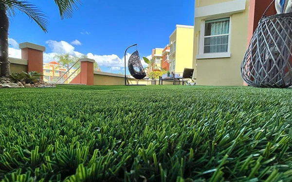 What do you put under artificial turf for a playground?