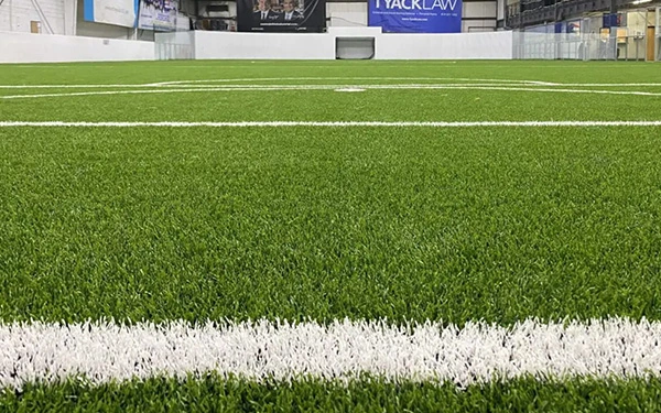 What scenarios can indoor artificial grass be used for?