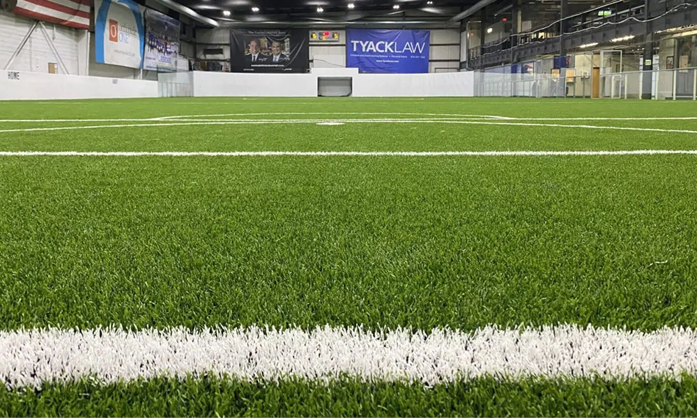 What scenarios can indoor artificial grass be used for?