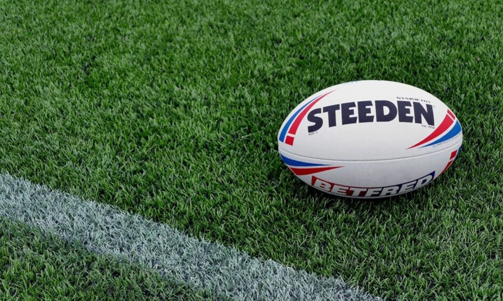 What is an artificial grass rugby field? Its advantage?