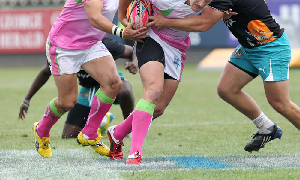 What is an artificial grass rugby field? Its advantage?