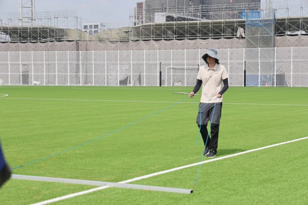FIFA technicians conduct flatness test on the auxiliary field of Taichung International Football Park